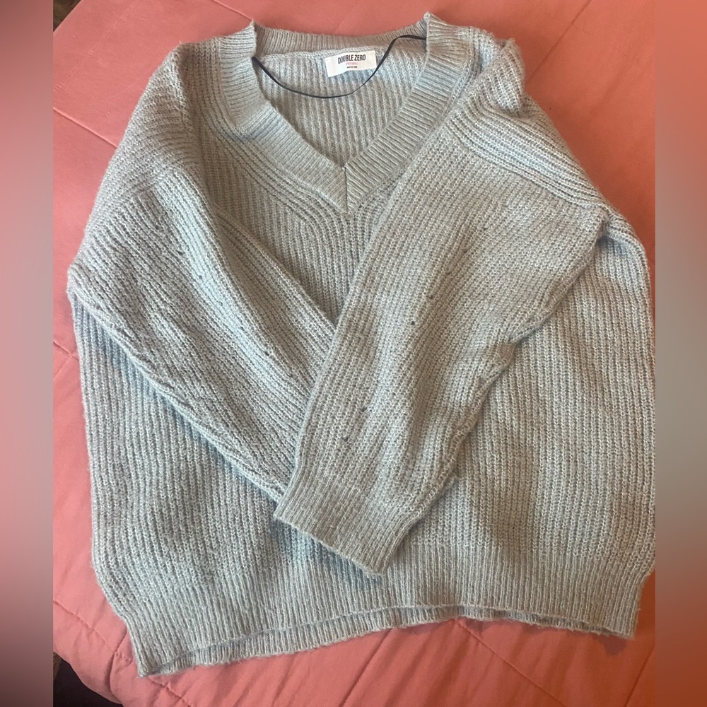 Blue Vneck sweater.